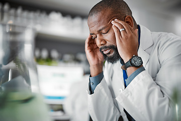 Image showing Headache, stress and black man with burnout from science, lab work and research innovation. Sad, frustrated and African scientist with migraine pain, anxiety and tired from healthcare analysis