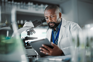 Image showing Black man thinking, science and tablet for online research, laboratory and healthcare sample. African American male, scientist or research in lab, digital data and update experiment results and focus