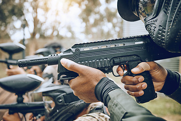 Image showing Paintball, gun and target with team, action and sports outdoor, people on battlefield and soldier focus during war game. Extreme sport, aim and military mission, exercise and fitness with motion blur