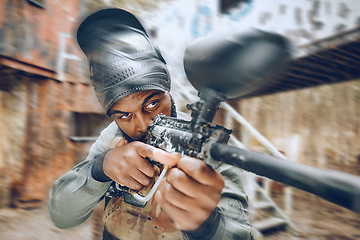 Image showing Black man shooting, paintball gun or war game with vision, aim or tactical strategy for army contest. Military exercise, soldier focus and warfare simulation for weapon combat, outdoor and mission