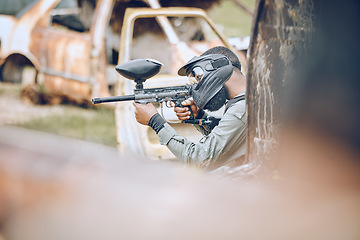 Image showing Action, paintball and target with man in field for sports, fitness and shooting games. War, soldier and adventure with gamer playing in camouflage for military, army and competition training