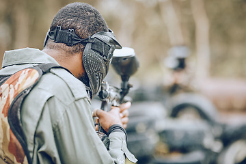 Image showing Paintball, man and game, gun and target, sport with fitness and battlefield challenge, war soldier outdoor. Mockup space, extreme sports and exercise, shooting range and military mission and training