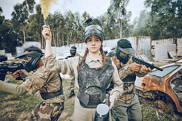 Image showing Start, battle and girl with smoke during paintball, military training and army game in Spain. War, alert and woman playing with gear and equipment during a competition, sports and action on a field