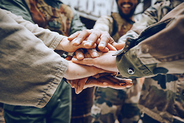 Image showing Soldier, team building or hands in a huddle for a mission, strategy or motivation on a paintball battlefield. Goals, collaboration or army people with support in a partnership or military group