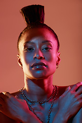 Image showing Portrait, face and makeup with a model black woman in studio on a neon background for beauty. Art, kaleidoscope and style with an attractive young female posing indoor for culture or cosmetics