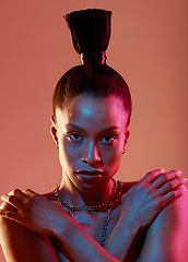 Image showing Portrait, serious and fashion with a model black woman in studio on a neon background for beauty. Art, makeup and style with an attractive young female posing indoor for culture or cosmetics