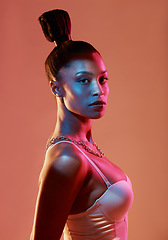 Image showing Portrait, fashion and hair with a model black woman in studio on a neon background for beauty. Art, hairstyle and style with an attractive young female posing indoor for culture or cosmetics