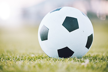 Image showing Soccer, ball and field for sports game time or match start in athletics or football tournament in the outdoors. Round sphere object with pentagon shape spots on green grass for sport on mockup