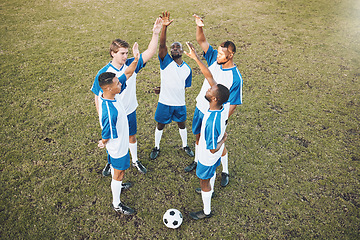 Image showing Men, football team and stretching in circle on field for training exercise and teamwork for muscle development. Group, soccer and start workout together for strong body, blood flow and stop injury