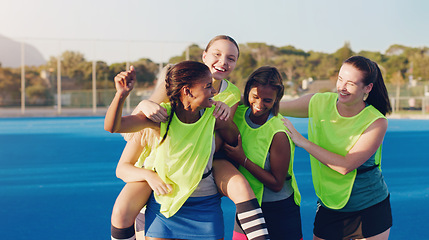 Image showing Women, hockey group and celebration on field together for support, solidarity and happy for fitness, training or goals. Sports teamwork, friends and hug from with winning goal, achievement or success