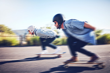 Image showing Sports, speed and blur, longboard race in road with men racing downhill on skateboard with helmet safety. Extreme sport adventure, friends skateboarding in street and skateboarder on mountain pass.