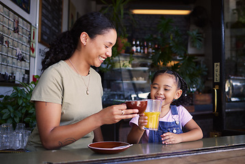 Image showing Coffee shop, black family and toast with a mother and daughter enjoying a beverage in a cafe together. Juice, caffeine and cheers with a woman and happy female child bonding in a restaurant