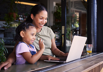 Image showing Mother, daughter and laptop for video call in cafe, greeting and conversation for quality time, relax or chatting. Love, mama or girl in coffee shop, online for connection or communication with smile