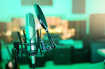 Image showing Music, audio and microphone for a singer, musician or artist in a studio for a performance. Podcast, radio and equipment for sound production, singing and musical entertainment in an empty room