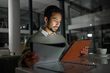 Image showing Businessman, tablet and analytics working at night for planning, documents or online research at office. Male employee with touchscreen in analysis, strategy or project plan for evening at workplace