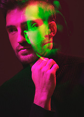 Image showing Double exposure, color and portrait of a man thinking isolated on a dark background in studio. Texture, design and face of a man with colorful overlay, creativity and digital concept on a backdrop