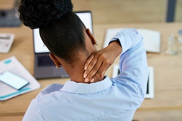 Image showing Black woman, neck pain and fatigue at office desk stretching or massage while tired or burnout. Anatomy or health problem of employee or business person with hands on body or spine injury accident