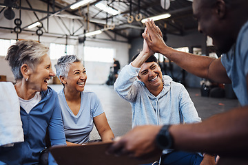 Image showing Fitness, senior women and personal trainer high five for health, routine and workout at a gym. Exercise, elderly and friends with health coach man hands connecting in support of goal collaboration