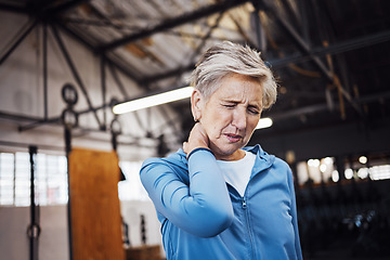 Image showing Neck pain, senior woman and injury in gym after exercise, workout or training accident. Sports, wellness and elderly female with fibromyalgia, inflammation or painful muscles after exercising alone.