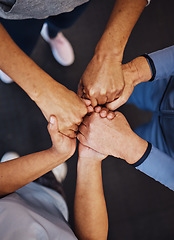 Image showing Hands, teamwork and fitness with sports people standing in a huddle at gym from above for health. Collaboration, support and motivation with a man and woman athlete group in a circle for exercise