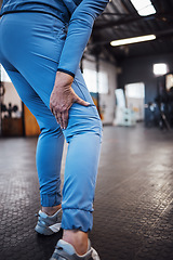 Image showing Leg injury, accident and pain at a gym after workout, training or sport exercise with bruise. Fitness, sports and woman athlete limping from a swollen, inflammation or sprain muscle at a studio.