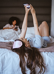 Image showing Video call, phone and relax with woman at sleepover for communication, internet and contact. Happy, online dating and smile with girl and friends in bedroom with technology, digital and social media