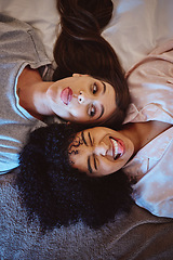 Image showing Comic friends, bed and face of women happy about a sleepover, quality time and fun in pajamas. Gen z people excited and funny in a bedroom with diversity, motivation and happiness in a bedroom