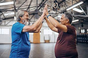 Image showing Elderly men, gym and high five for fitness, teamwork motivation and diversity with friends happiness. Senior training partnership, asian and black man for mma workout, exercise and team building goal