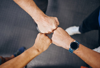 Image showing Fist bump, motivation in workout in gym, training or exercise for strong muscles, healthcare or wellness. Top view, hands or men support in teamwork, collaboration or community in fitness diversity