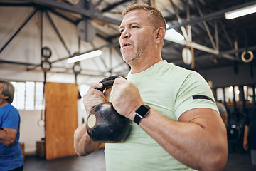 Image showing Elderly man, gym and kettlebell at training for health, wellness and fitness with smartwatch. Senior bodybuilder workout, vision or exercise with group for goal, muscle development or body healthcare