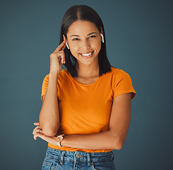 Image showing Woman, portrait and listening to music online while happy on a studio background. Smile on face of a young gen z person with earphones for podcast, radio or audio sound to relax while streaming