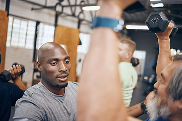 Image showing Gym, old man and help from personal trainer with dumbbell weightlifting, muscle building and fitness in retirement. Health, exercise and workout at senior training club, sports coach helping grandpa