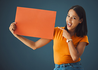 Image showing Woman, poster portrait and wow mockup space for sale, discount or promotion. Model pointing or advertising product placement, logo or brand billboard on paper sign or banner in studio background