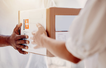 Image showing Box, delivery and hands of courier man with a customer for ecommerce, orders and online shopping package. Hand, person and guy giving woman parcel, goods or retail product at the door of her home