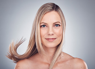 Image showing Beauty portrait, hair care and woman in studio with natural makeup cosmetics and shampoo. Face of happy aesthetic model person on grey background for hairdresser or salon product for growth or shine