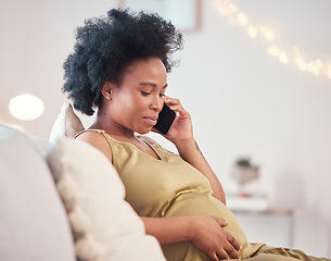 Image showing Pregnant, phone call and black woman in home, talking or chatting to contact on living room sofa. Technology, pregnancy or future mom with mobile smartphone for networking, conversation or discussion