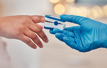 Image showing Digital pulse device on finger, doctor checkup in hospital and close up of blood oxygen level measurement. Testing for diabetes in clinic, monitor bodys health with instrument and healthcare expert