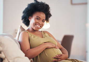 Image showing Pregnant, love and portrait of black woman on sofa in home with hope and care for unborn baby. Pregnancy, prenatal motherhood and future mama relax in living room and touching belly for infant health