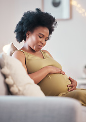 Image showing Pregnant, sofa and black woman hands with hope feeling relax and mother love. Mom care, couch and living room lounge with a person holding abdomen happy about pregnancy lifestyle and baby in a house