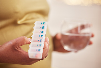 Image showing Pregnant woman, medicine and water for health and wellness with pregnancy supplements. Pills box in person hand drinking iron or magnesium tablet for growth, immune and stomach or chronic healthcare