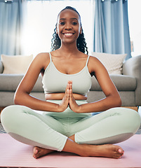 Image showing Yoga, namaste woman and zen portrait in living room for fitness, exercise and mindfulness, healing or peace. Meditate, spiritual and black person praying or prayer hands for happy, self care wellness