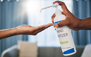 Image showing Hands, sanitizer and drop for hygiene, bacteria or germs to combat disease, illness or virus at home. Hand of person using chemical, alcohol or hand wash for safety, protection or disinfect indoors