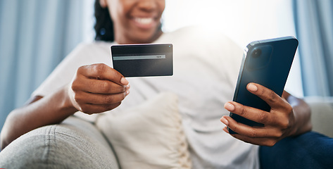 Image showing Phone, online shopping or black woman with credit card for payment, internet purchase or ecommerce in living room. Fintech, happy or girl on smartphone for trading, banking or invest on home sofa