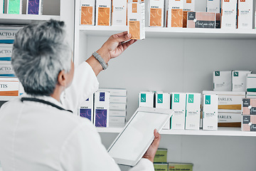 Image showing Pharmacy, tablet and mockup with senior woman in store for healthcare, wellness or retail. Product, technology and prescription with pharmacist and medicine stock for shopping, medical or inventory
