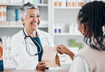 Image showing Happy senior pharmacist with medicine for a black woman for retail healthcare treatment or consultation. Consulting, trust or mature doctor helping a customer shopping for medicine, pills or drugs