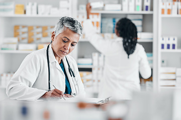 Image showing Healthcare, notes and pharmacist writing paperwork for medicine, stock checklist and inventory. Pharmacy, working and woman with a document for clinic pills, product and medical information at job