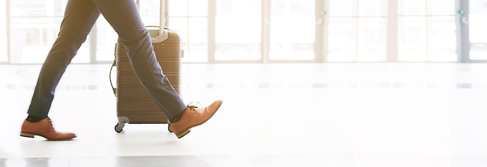 Image showing Travel, floor and businessman walking with luggage for work, airport arrival and conference. Corporate, working and legs and shoes of an employee on a trip for business and professional seminar