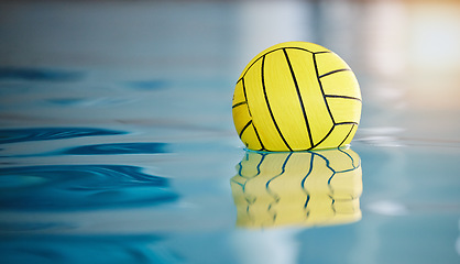 Image showing Water polo, sports and ball on swimming pool surface for game, competition and practice for match. Aquatic sport, fitness mockup and professional equipment for training, exercise and motivation