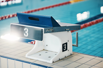 Image showing Swimming, sports and podium number by pool for training, exercise and workout for triathlon competition. Fitness, motivation and three on empty starting board board for swimmer, diving and race