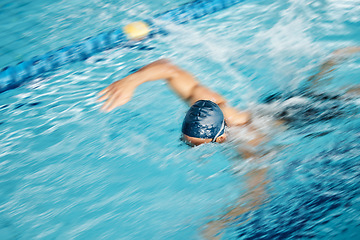 Image showing Man, speed or freestyle stroke in swimming pool cap for sports wellness, training or exercise for body healthcare. Workout, fitness and swimmer athlete in motion blur for water competition challenge